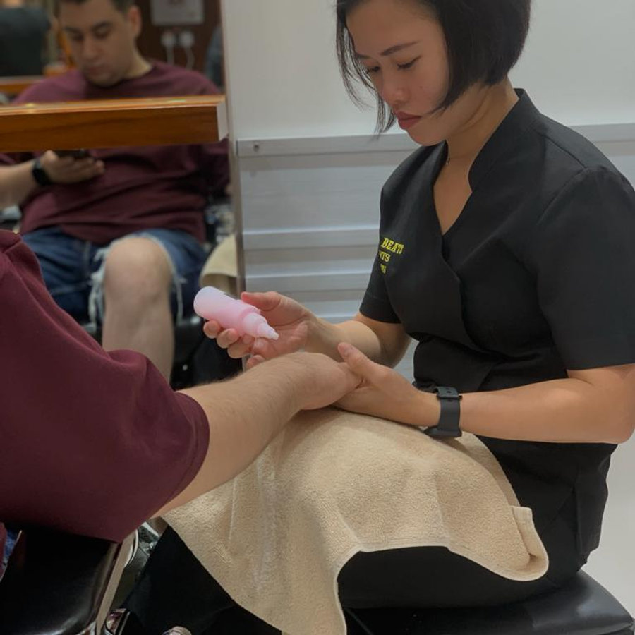 Nail care service at Hair Beats Gents Salon
